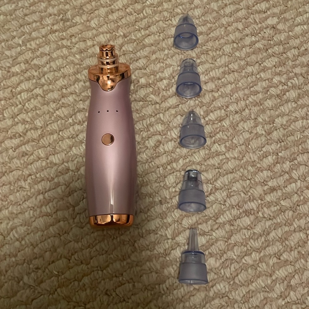 Pore sucker, 5 detachable head pieces. Brand new.
